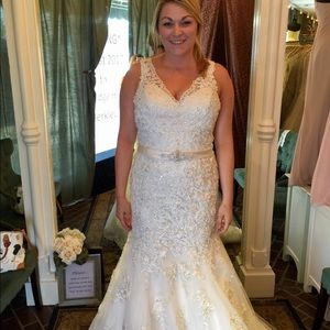 Brand new, never worn or altered wedding gown